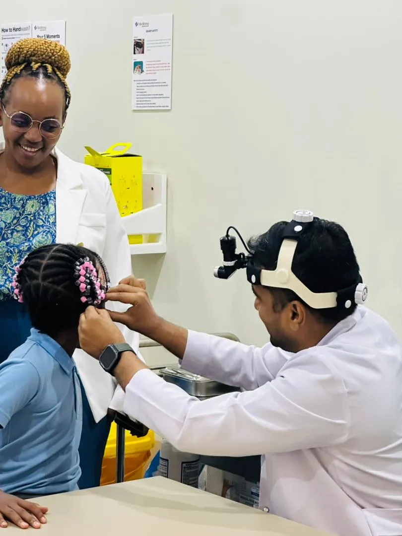Healthcare worker conducting hearing test
